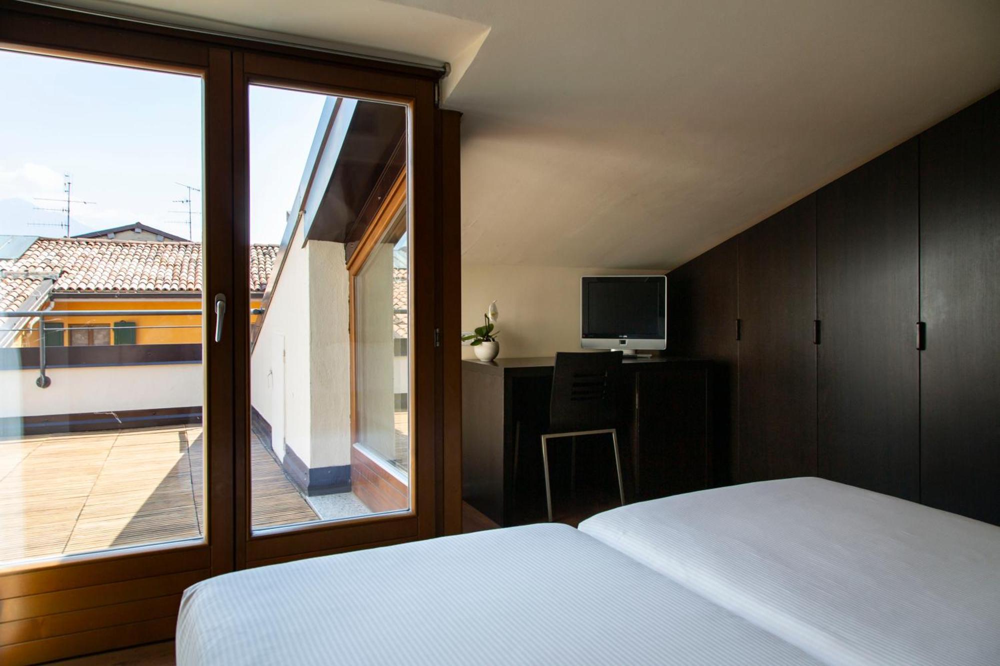 Hotel Antico Borgo Riva del Garda Szoba fotó